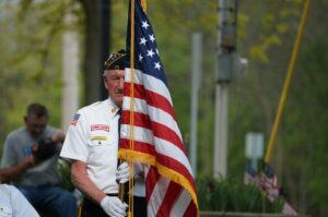 Veteran with American flag